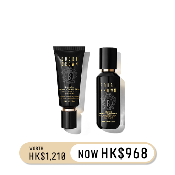 Model applying Skin Long-Wear Weightless Foundation to skin with a foundation brush